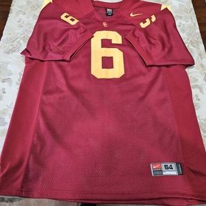 A Mark SanchezUSC TROJANS home jersey. Always dry cleaned. Red with yellow #. XL